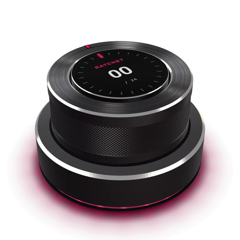 Detent One in Graphite, three-quarter view from above, display lit